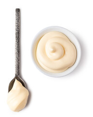 Bowl and spoon with mayonnaise