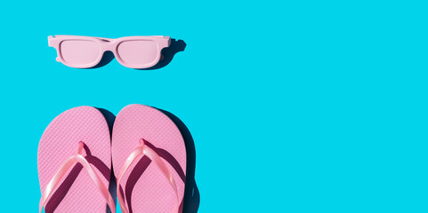 Beach accessories on blue background.Summer vacation. Creative concept.Travel mood to the sea.