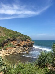 Obraz premium Cliff and Waves in a Tropical country ocean 
