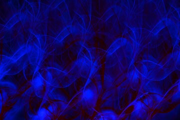 Abstract blue smoke with red lines, mysterious theme.