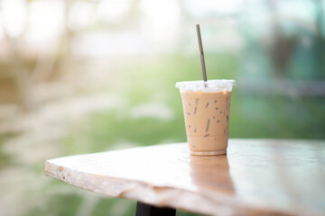 Iced coffee resting on the table background blurred