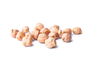 Heap of raw chickpea beans isolated on white background. Healthy vegetarian food concept. Pile of uncooked chickpeas