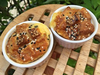 Eggs pudding cup cakes mixed sesame seeds
