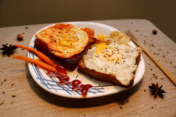 Breakfast prepared with bread and eggs. 