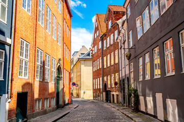 Colorful houses in the old cozy medieval street of Copenhagen, Denmark.