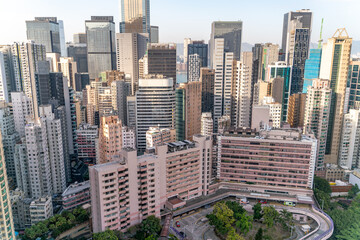 Fototapeta premium The amazing view of Hong-Kong cityscape full of skyscrapers from the rooftop.
