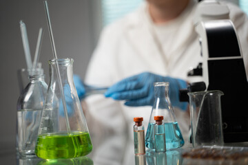 male lab technician conducts laboratory work