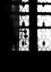 old key hanging in cupboard 