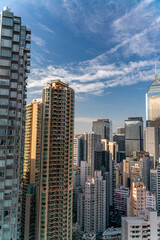 Fototapeta premium The amazing view of Hong-Kong cityscape full of skyscrapers from the rooftop.