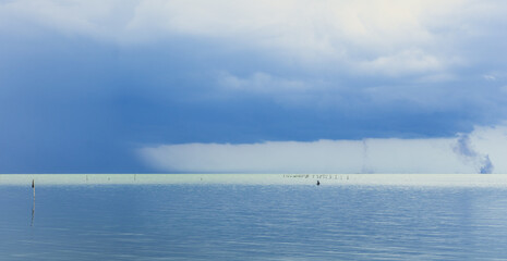 cloudy sky in deep blue sea