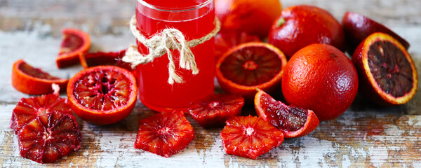 Freshly squeezed juice of red orange. Bloody oranges. Detox fresh. Selective focus. Macro.