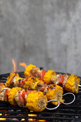 chicken skewer with corn and red pepper