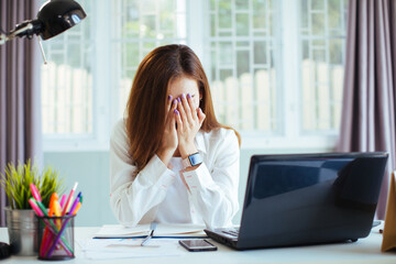 Obraz premium Sad Businesswoman With Document Sitting In Office