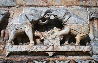 bas-relief-sculptures of elephants on the wall of the temple of India
