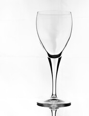 empty wine glass against a white background