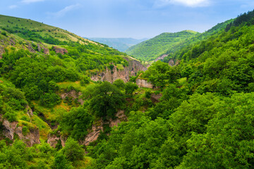 Fototapeta na wymiar Mountains of Armenia, landscapes of Khndzoresk city on a summer day