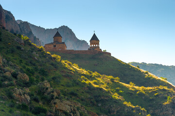 Orthodox monastery Noravank on a rock in the morning sun, a landmark of Armenia