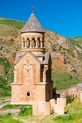 Fototapeta na wymiar View of Noravank Monastery on a red rock summer morning, a famous landmark of Armenia