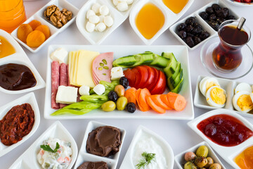 Traditional Turkish Breakfast designed around of breakfast plate.Top view