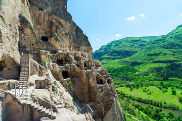 View of the ancient cave city carved into the rock - a famous attraction of Georgia Vardzia