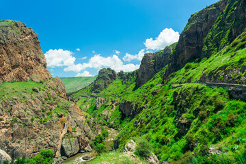 Fototapeta na wymiar Picturesque canyon in the beautiful mountains of Georgia on a sunny summer day landscape