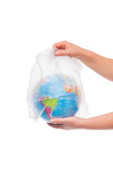 hand freeing the earth from a plastic bag, the concept of pollution of the planet