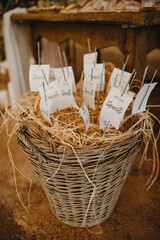 Wicker basket filled with hay, sparklers with cards and the inscription let love sparkle