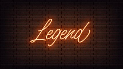Orange neon Legend, lettering. Neon text of Legend on black brick background