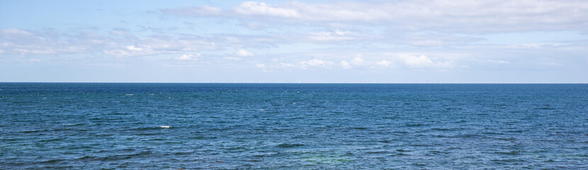 Fototapeta na wymiar view of the sea - landscape of blue water and sky 