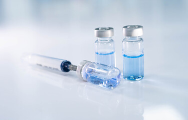 close up vaccine and syringe injection for prevention from  virus infection