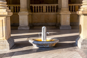 Fountain with thermal healing water in Karlovy Vary, Czech Republic.