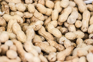 raw peanuts pile at market