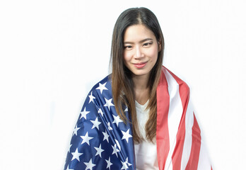 Fototapeta premium A beautiful woman celebrating american national independence day on 4th July