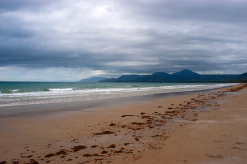 Four mile beach at Port Douglas with heavy storm clouds on the sky