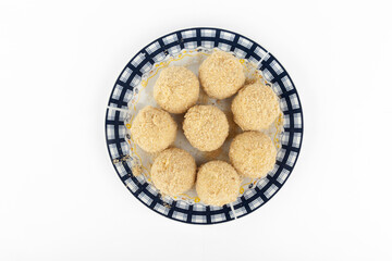 dumplings with plums on a plate