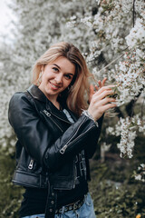 Portrait of a young girl. Photo session of a stylish girl outdoors.
