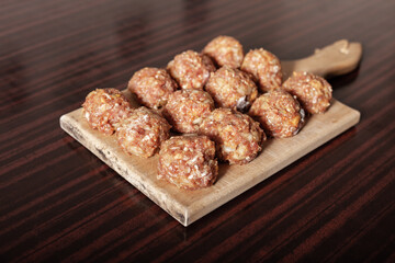 meat balls on old wooden board stock photo