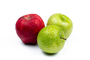red and green apples on a white background
