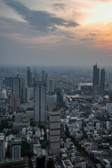 panoramic skyline of Bangkok at sunset from King Power Mahanakhon, Bangkok, Thailand