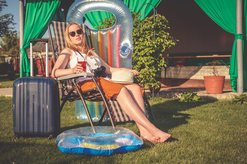 Staycations,Social distance. gen z travels alone suitcase to the covid 19 coronavirus pandemic,...