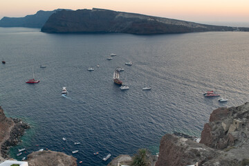Shot of a number of sailing ship at the Caldera of Santorini