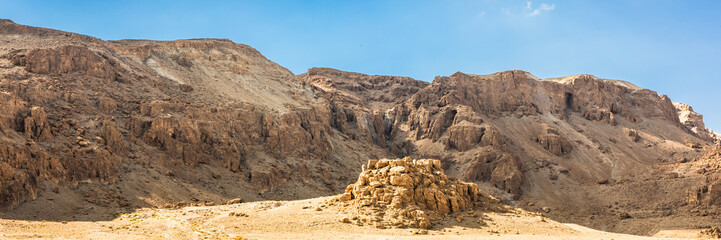 Obraz premium Caves of Qumran, manuscripts of the Dead Sea. Web banner in panoramic view.