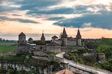 Fototapeta premium Kamianets-Podilskyi Castle, Ukraine at sunset. Horizontal orientation. 