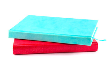 Red and blue notebooks, diaries, men's and women's. Isolated on a white background