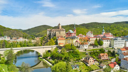 Fototapeta na wymiar Panoramic view of Loket castle and bridge over the river Ohri , Czech Republic.
