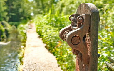  The rusty remains of the historical lock gate opening and closing mechanism at Honing lock on the Honing and Dilham canal