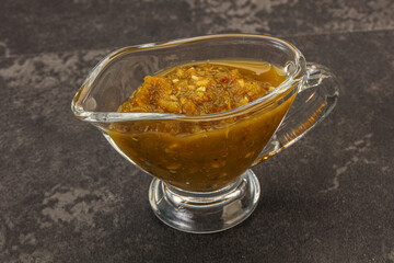 Green spicy sauce in the bowl