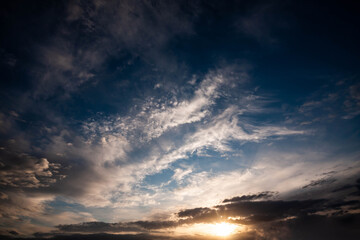 Fototapeta na wymiar Sunset cloud formations in the sky.