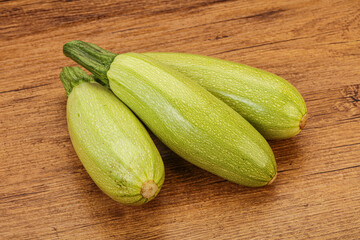 Young tasty zucchini over board