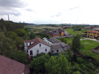 Fototapeta na wymiar Aerial view of the saburb landscape (drone image). Kiev Region